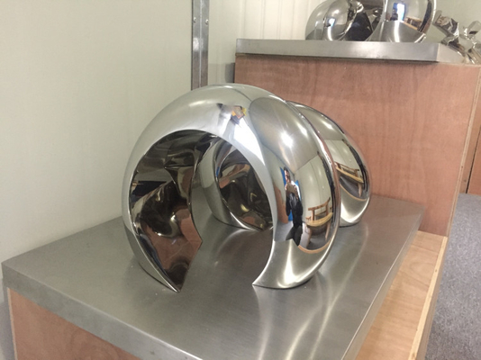 La decorazione della casa dell'OEM scolpisce la scultura lucidata specchio astratto di acciaio inossidabile