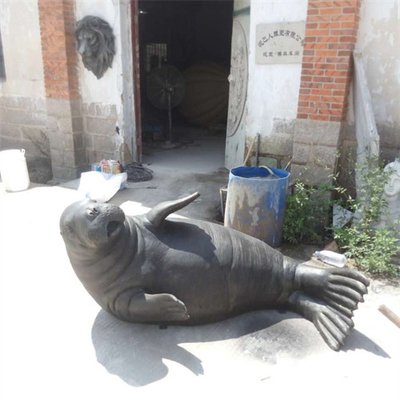 Il giardino animale bronzeo del tricheco a grandezza naturale del mare scolpisce all'aperto per la decorazione