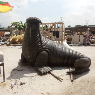 Il giardino animale bronzeo del tricheco a grandezza naturale del mare scolpisce all'aperto per la decorazione