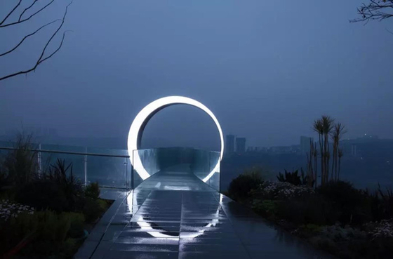 Le sculture all'aperto del giardino del portone della luna del cerchio hanno lucidato inossidabile su misura