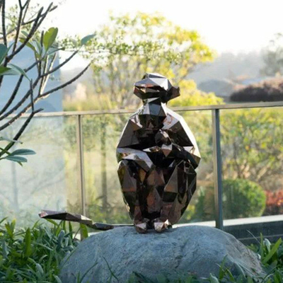 L'animale del giardino del prato inglese scolpisce la scultura bronzea della scimmia della geometria del metallo