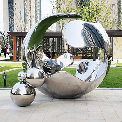 Il giardino all'aperto di acciaio inossidabile dello specchio scolpisce la palla vuota decorativa lucidata